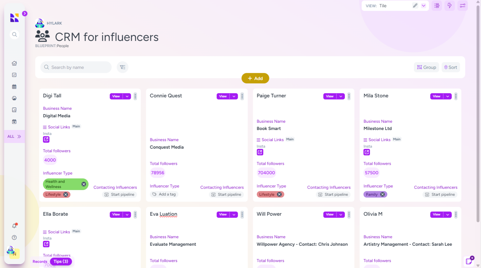 A screenshot of the "CRM for Influencers" dashboard in the Hylark app. It features profiles of influencers displayed in a tile format. Each profile includes the influencer's name, business name, social links, total followers, and influencer type. Influencers shown include:

Digi Tall (Digital Media) with 4000 followers (Health and Wellness, Lifestyle)
Connie Quest (Conquest Media) with 78956 followers
Paige Turner (Book Smart) with 704000 followers (Lifestyle)
Mila Stone (Milestone Ltd) with 57500 followers (Family)
Ella Borate
Eva Luation
Will Power (Willpower Agency)
Olivia M (Artistry Management)
The left sidebar contains navigation icons and a small profile icon at the bottom. The top right has view options, currently set to "Tile," and buttons for grouping and sorting.